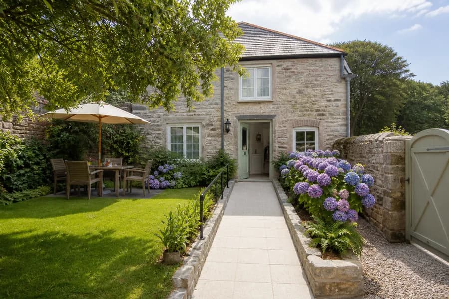 Fictional Garden House with hydrangeas and a step-free garden entrance